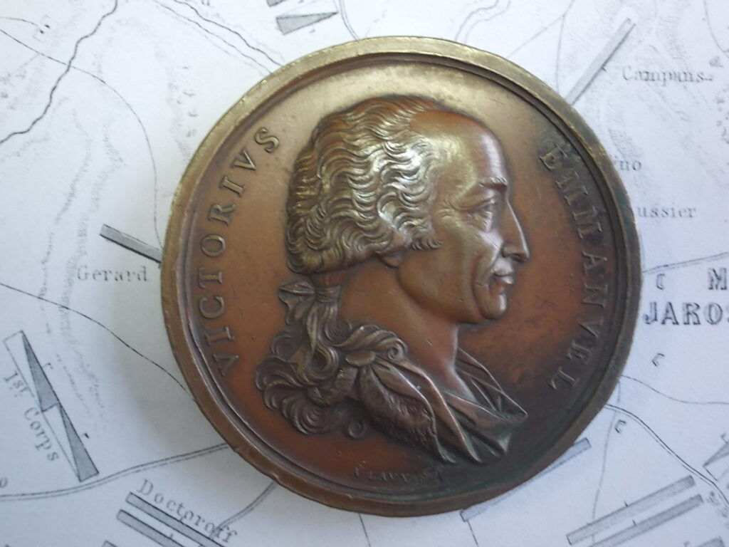 Medaglia per il ritorno del re a Torino: al dritto il busto con la legenda «VICTORIVS EMMANVEL».